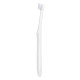 Orthodontic toothbrush with a tuft and a small head, White